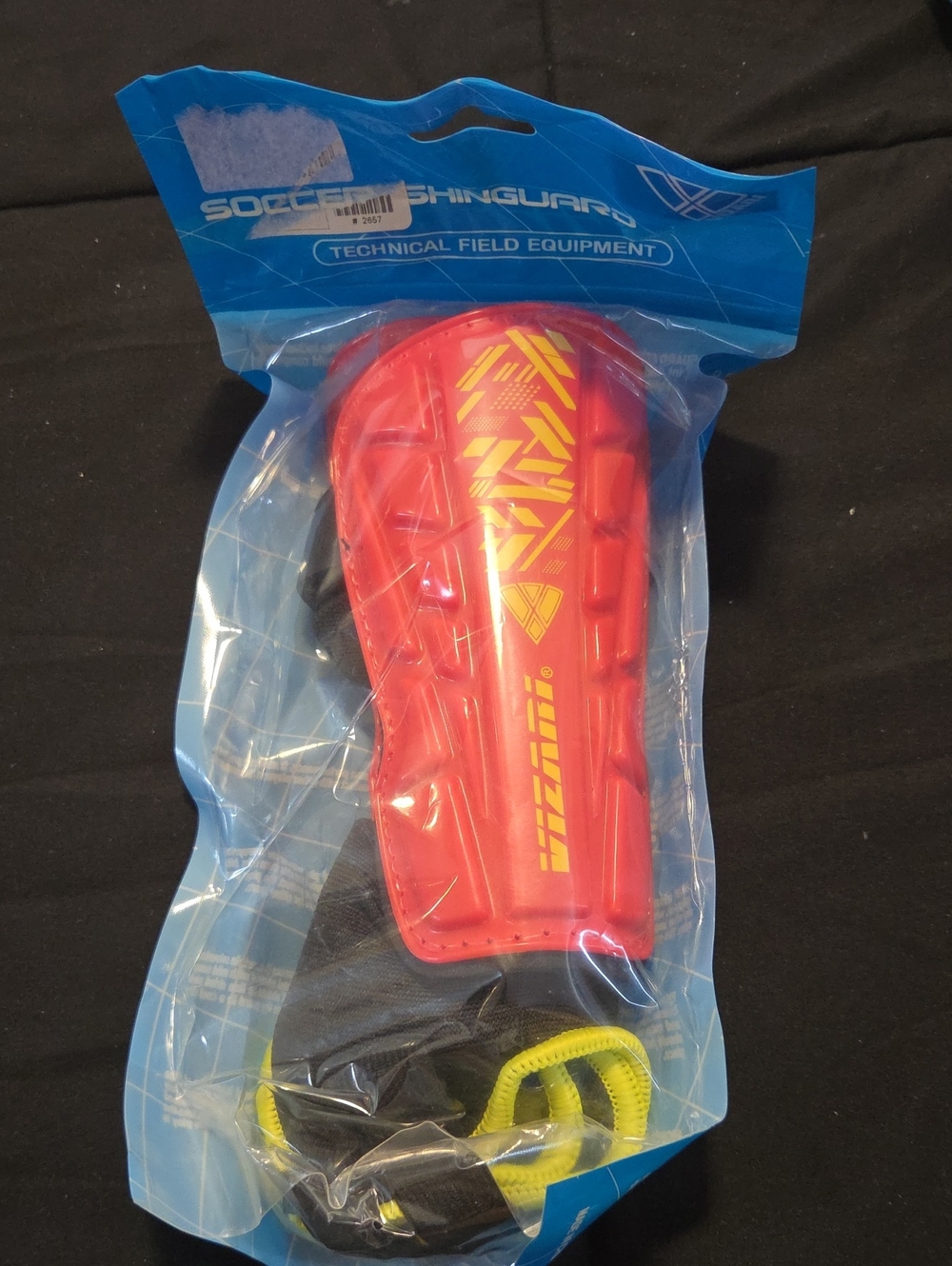 Red Soccer Shin Guards with Yellow Accent